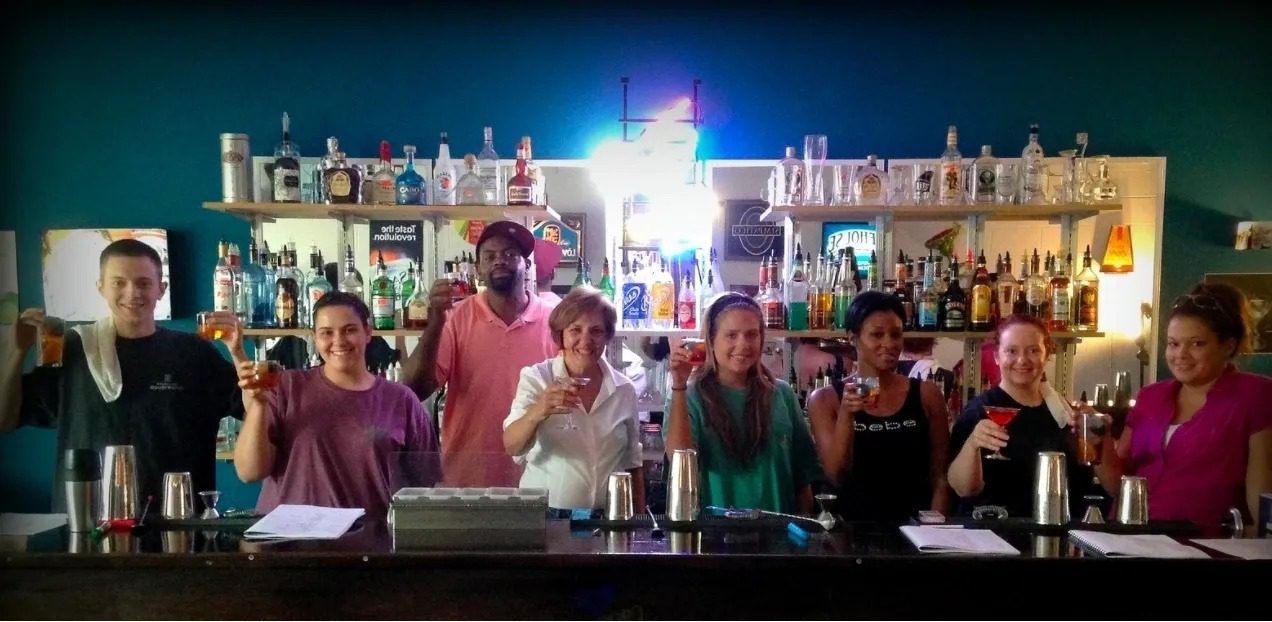 Bartending training in Savannah Georgia with cocktails and bar tools